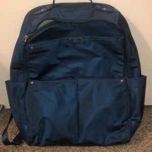Tumi blue backpack